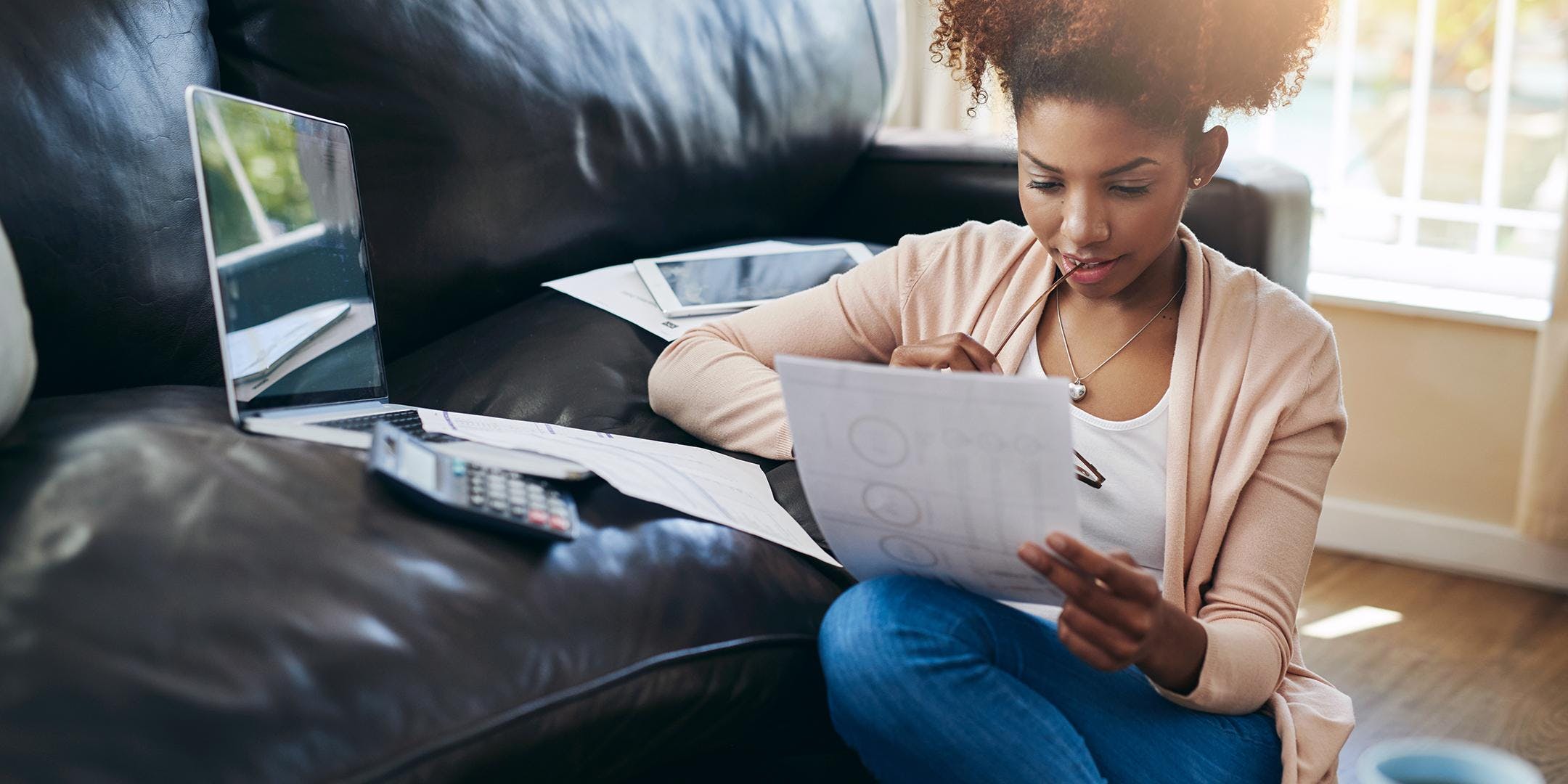 woman looking at finances