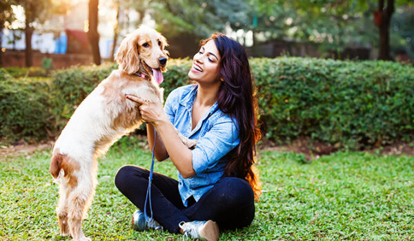 Indian woman with her beloved pet dog