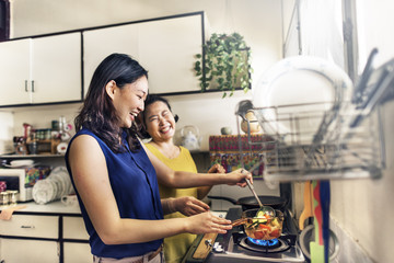 two women cooking