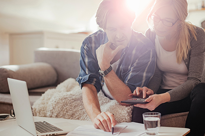 couple working on bills