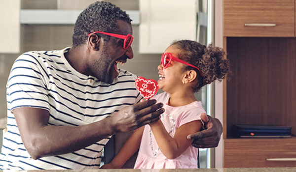 Dad and child playing