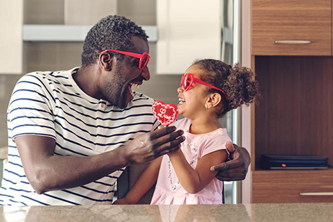 Dad and child playing