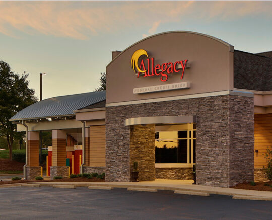 picture of the exterior of the Bermuda Run Financial center at sunset