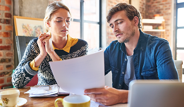 Couple reviewing papers