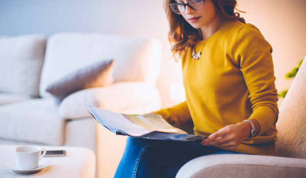 Lady reading paper