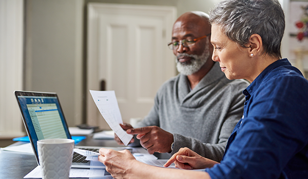 older couple reviewing forms