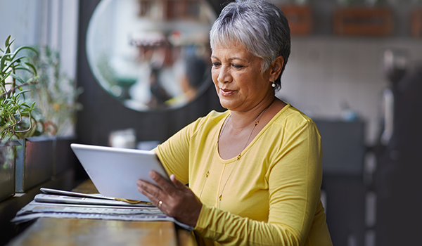 Woman looking at tablet