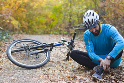 Injured ankle while biking in the autumn woods