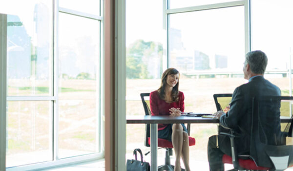 Couple near glass window