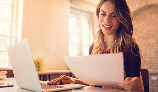 Woman typing on computer