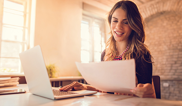 Woman typing on computer